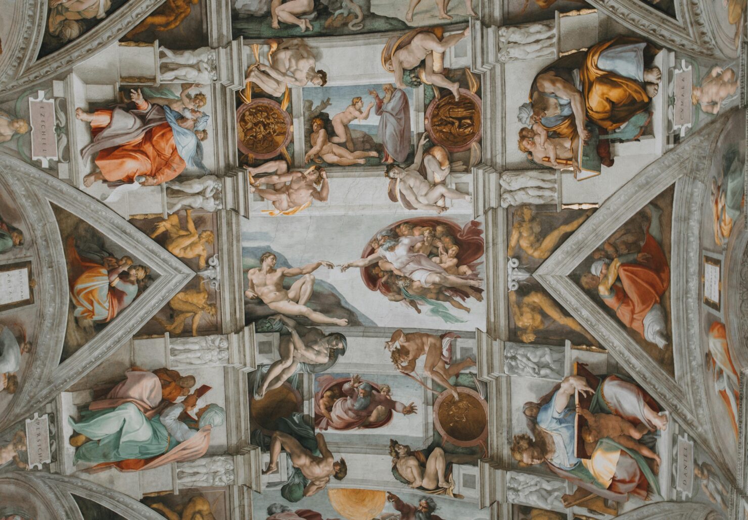 Ceiling fresco of the Sistine Chapel in Vatican City, featuring Michelangelo’s iconic “The Creation of Adam” at the centre. Surrounded by vivid biblical scenes and powerful figures of prophets and sibyls, the intricate composition showcases High Renaissance artistry in one of the Vatican’s most visited landmarks.