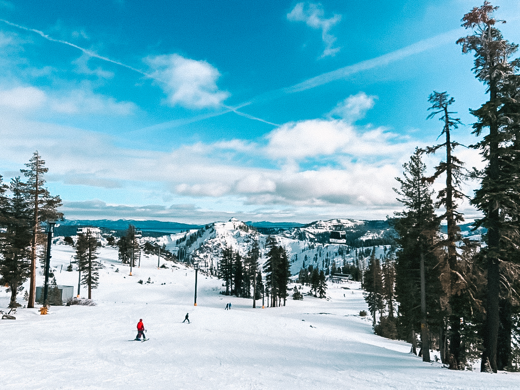 Skiers in Palisades Tahoe Resort, California